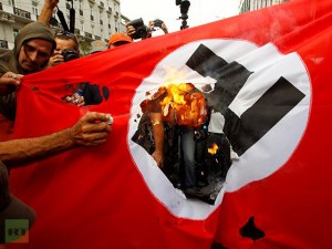 demonstrators-burn-flag-emblazoned