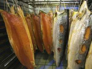 Salmon hang in the the Smokery at H. Forman and Son on Fish Island in east London