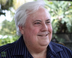 Controversial billionaire Clive Palmer poses for pictures at his golf resort and spa in Coolum, Sunshine Coast