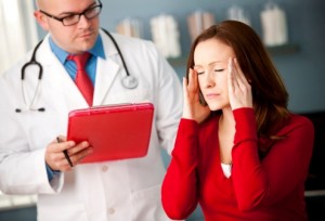 Exam Room: Doctor Consoling Patient with Migraine
