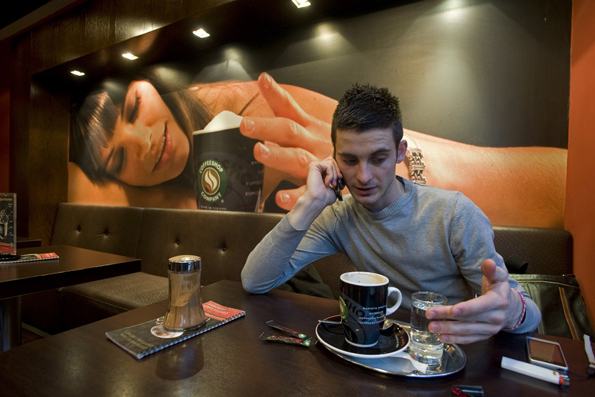 Ivan is talking to his boyfriend on the phone in a coffee bar in Skopje.